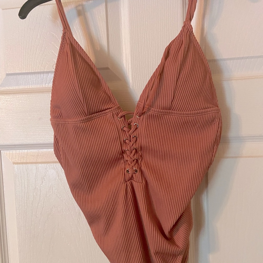 Light pink ribbed bodysuit